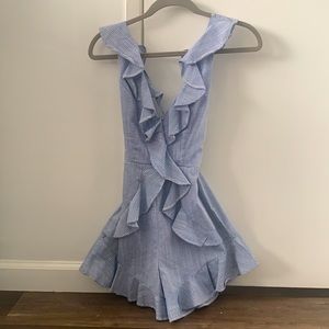 Romper light blue/white stripes and ruffled.